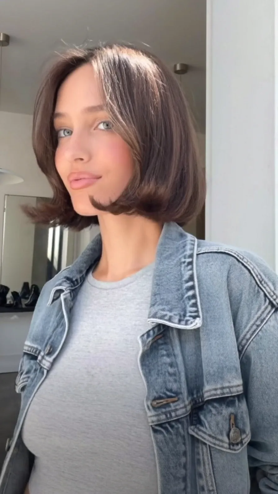 Classic Flicked Chin-Length Bob with Curtain Bangs