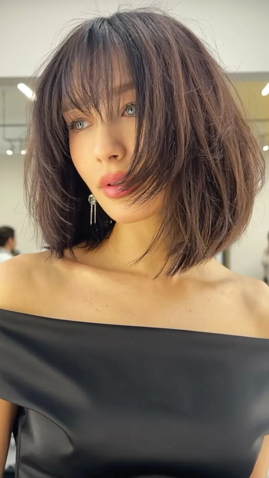 Choppy Textured Chin-Length Bob with Soft Wispy Bangs