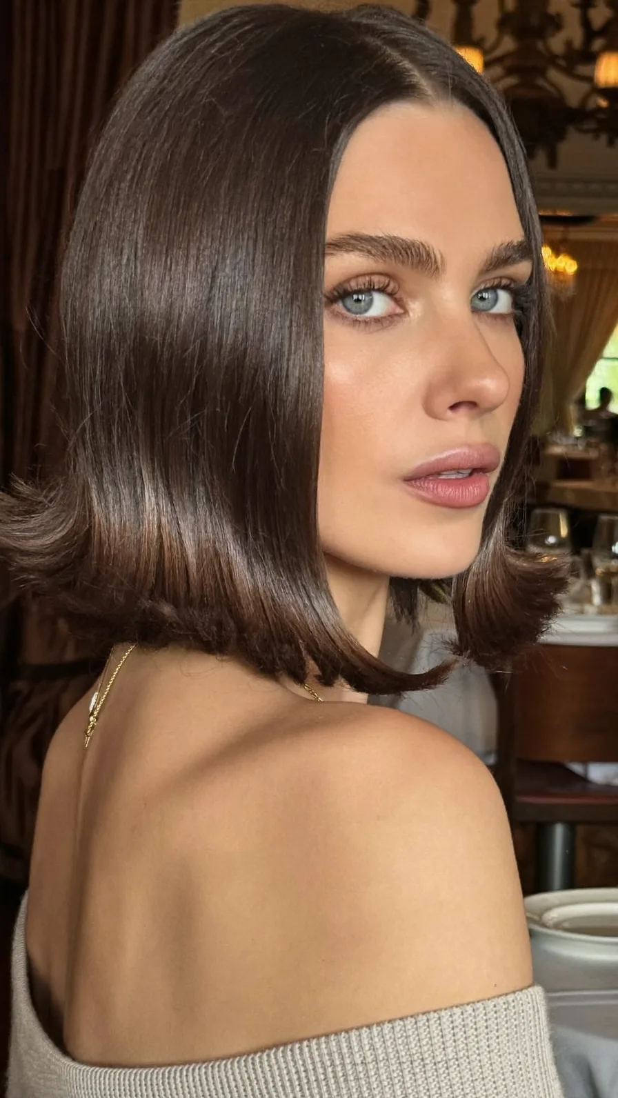 Sleek Chin-Length Blunt Bob with Flipped Ends Style