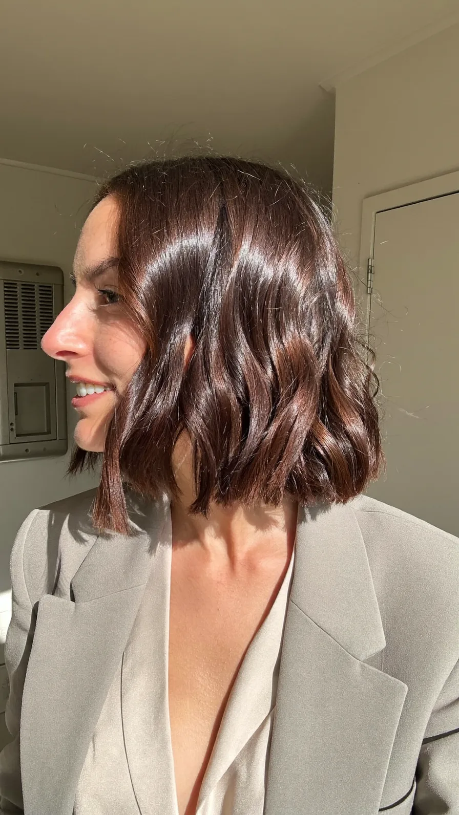 Classic Chin-Length Wavy Bob with Center-Parted Long Bangs