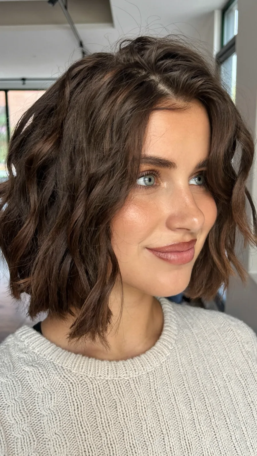 Textured Chin-Length Bob with Curtain Bangs for Volume