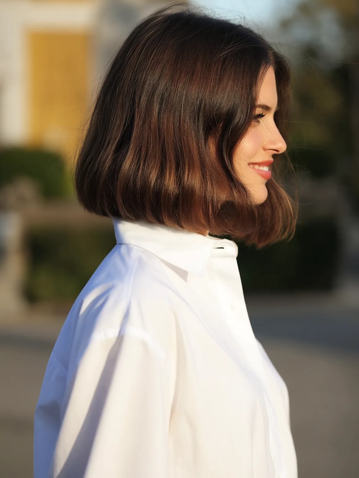 Chin-Length Wavy Bob with Side-Swept Framing Bangs