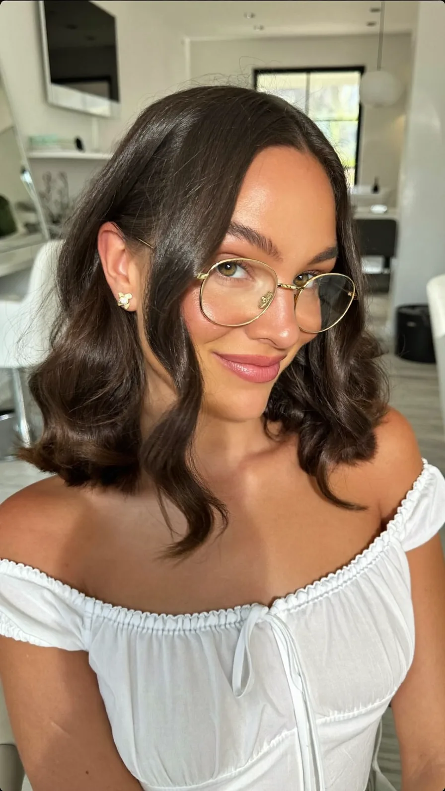 Elegant Chin-Length Soft Waves with Center Curtain Bangs