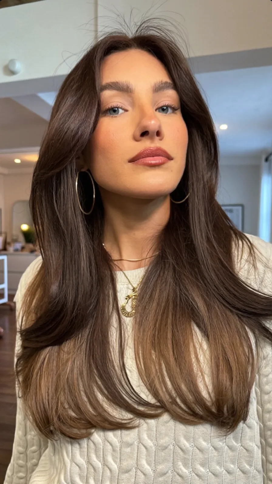 Flowing Long Layers with Subtle Caramel Balayage and Curtain Bangs