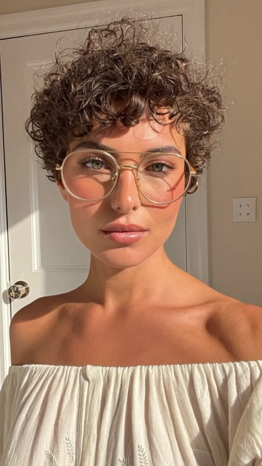Voluminous Curly Pixie Cut with Soft Textured Layers