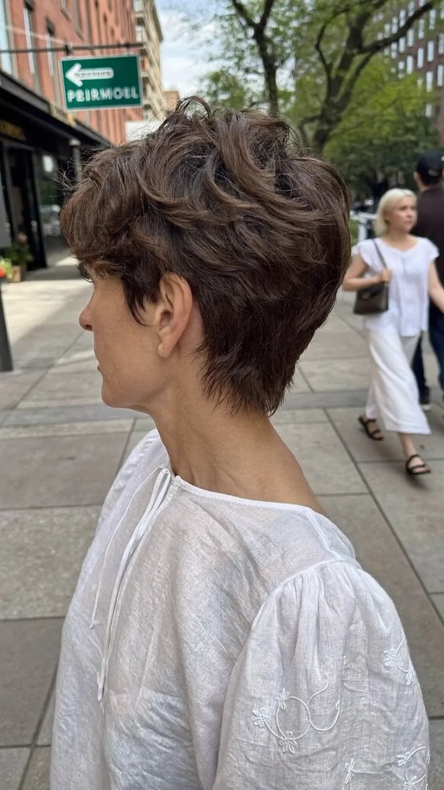 Voluminous Textured Short Pixie with Side-Swept Bangs