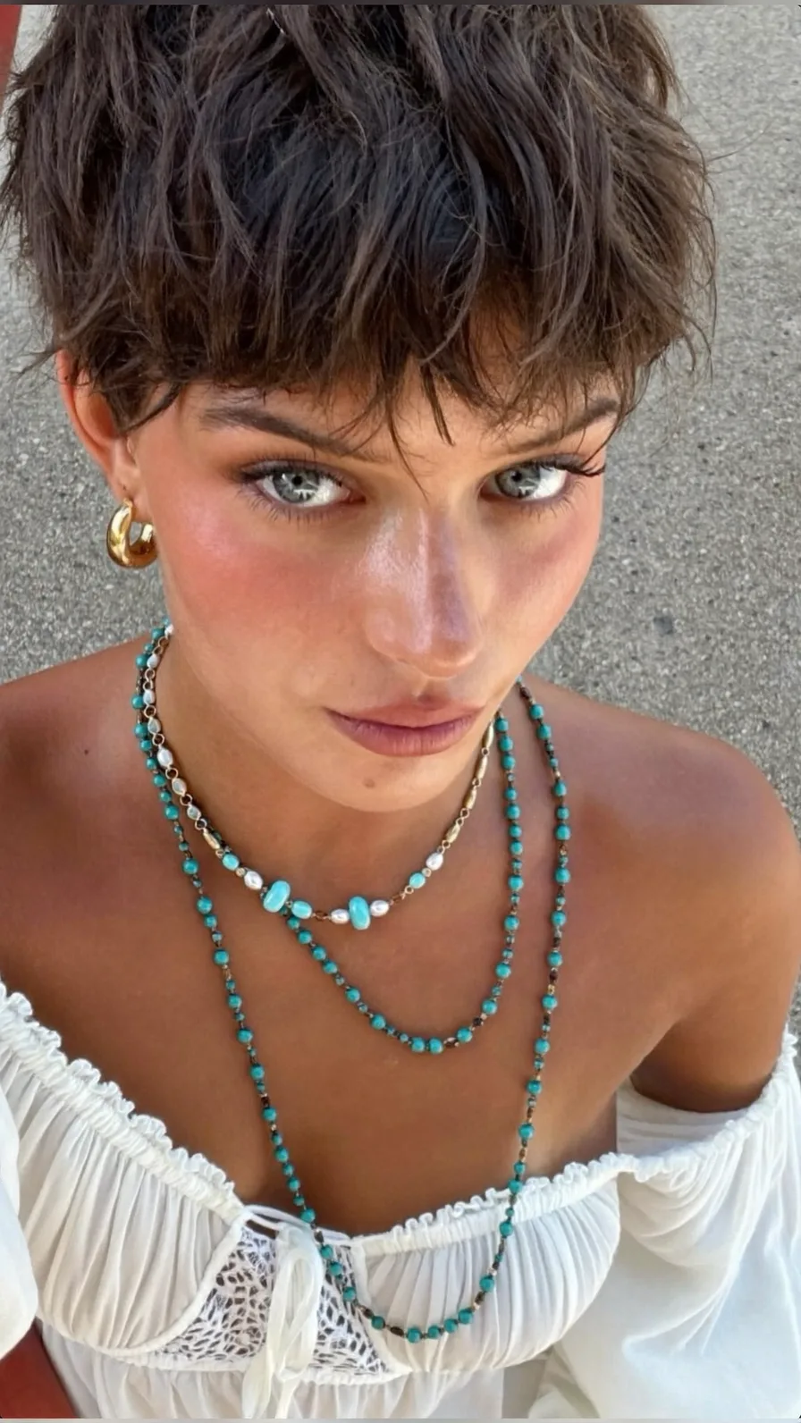 Modern Textured Pixie Cut with Wispy Bangs for Thick Hair