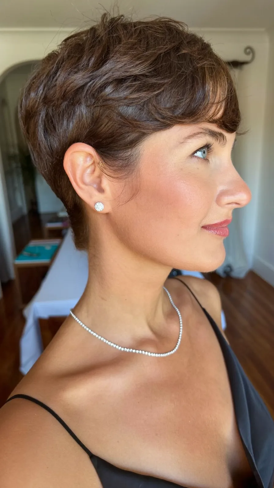 Textured Dark Chocolate Pixie Cut with Long Side Bangs