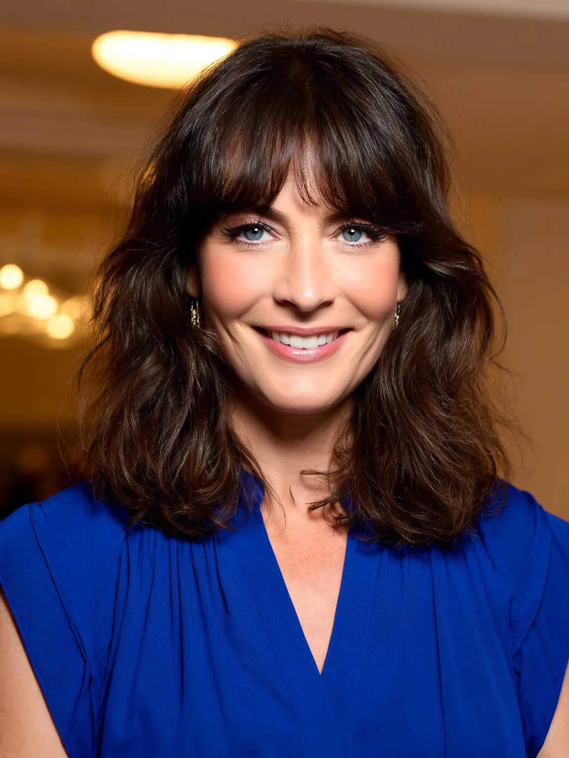 Wavy Shoulder-Length Lob with Natural Curtain Bangs