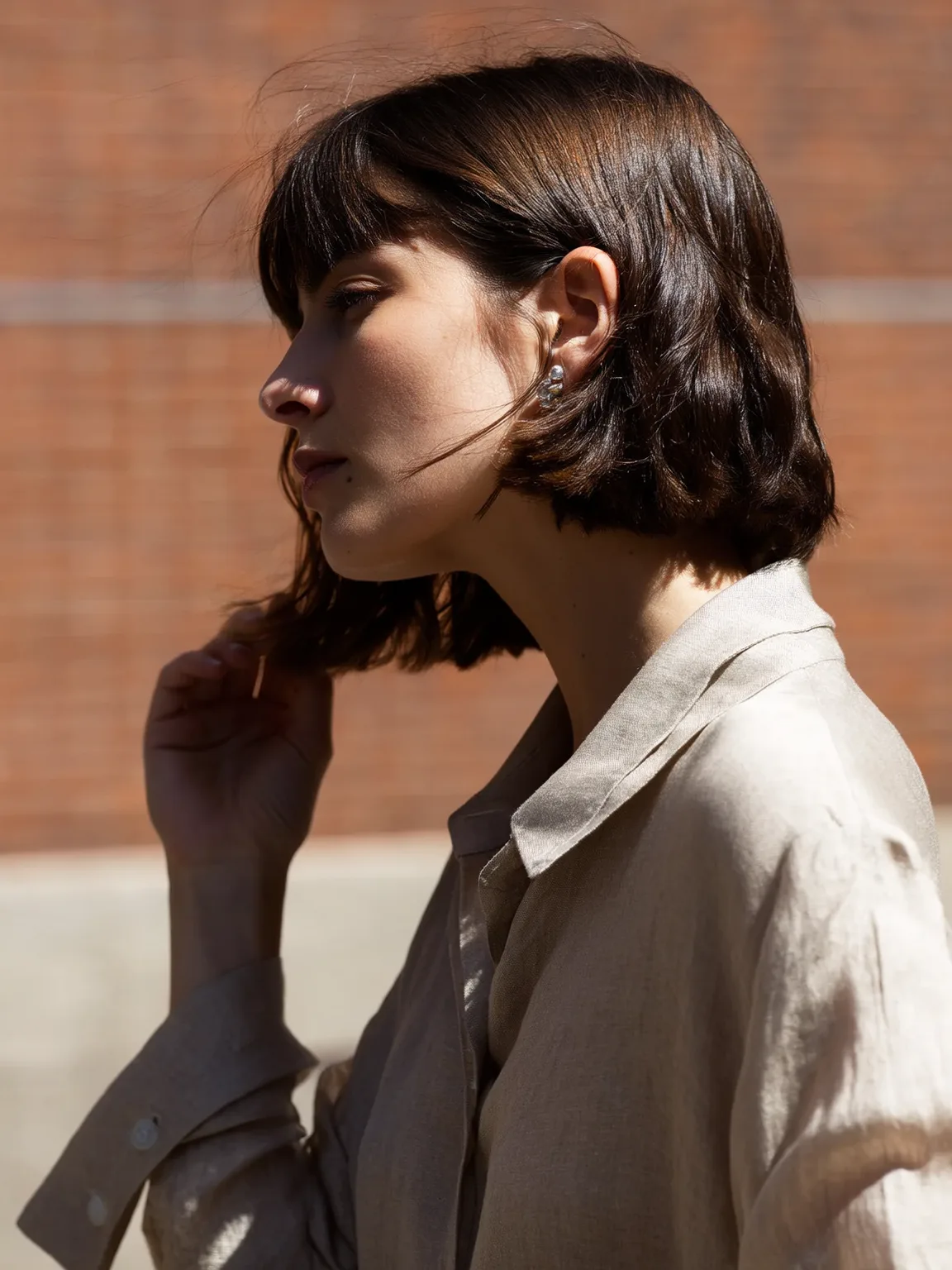 Chin-Length Blunt Bob with Warm Chocolate Brown Hue