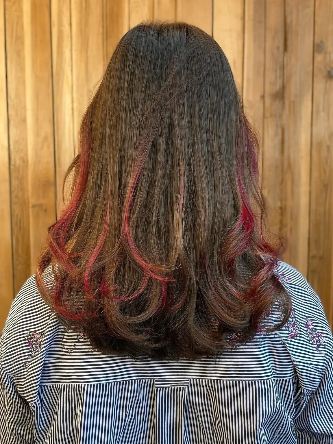 Medium Layered Waves with Red Balayage Highlights