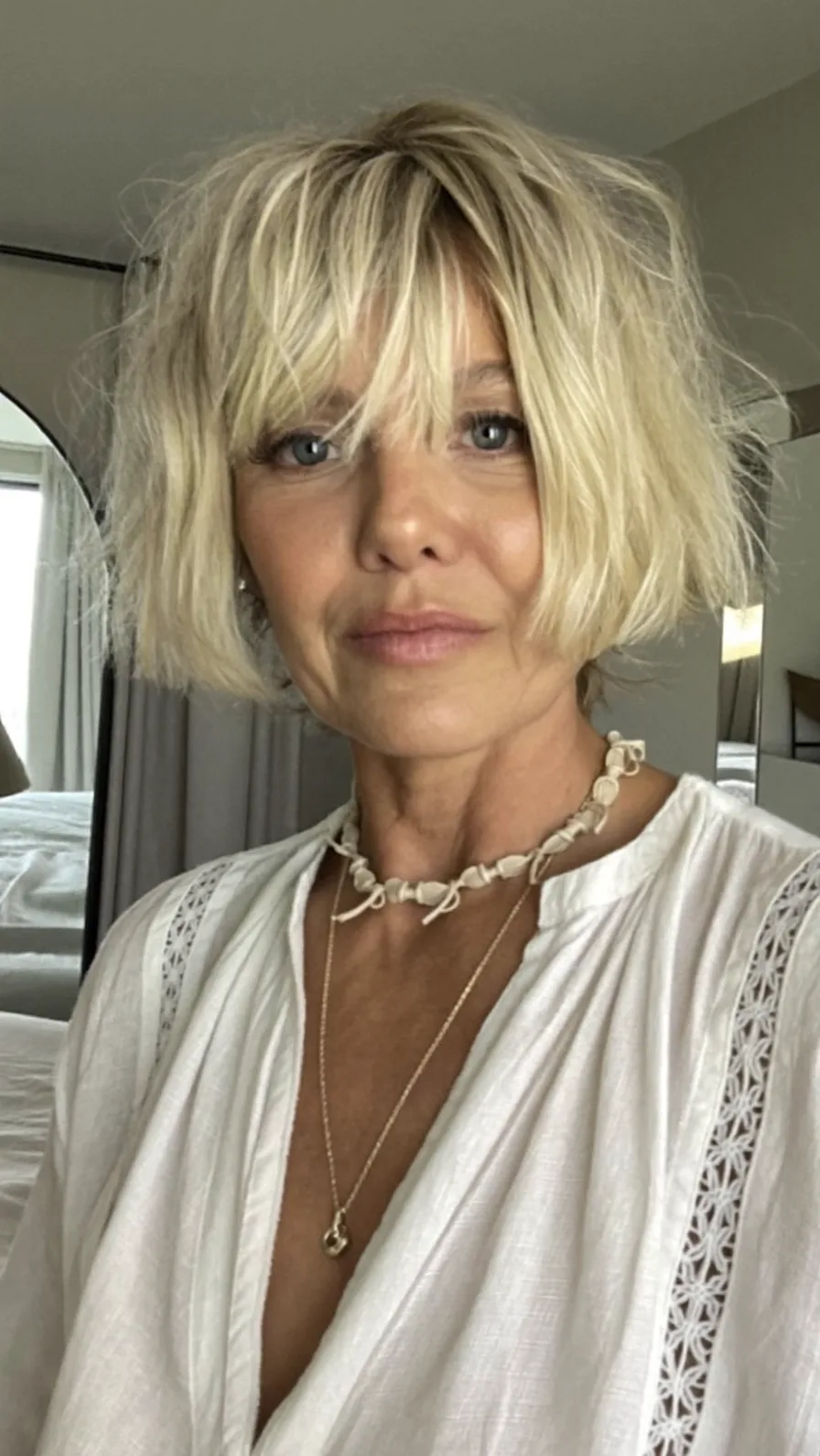 Textured Choppy Bob with Curtain Bangs for Sophisticated Style