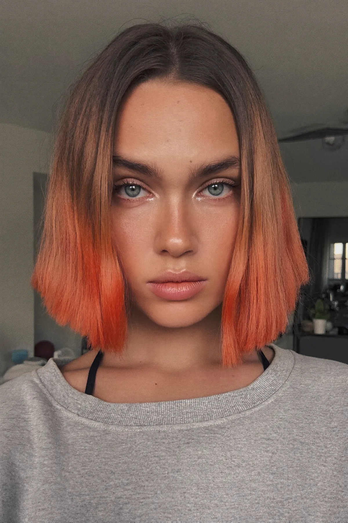 Chin-Length Sleek Strawberry Blonde Bob with Chunky Highlights