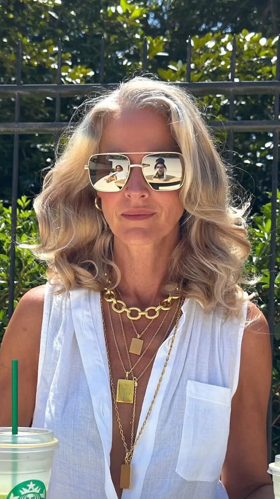 Voluminous Layered Blowout with Cool Ash Blonde Highlights