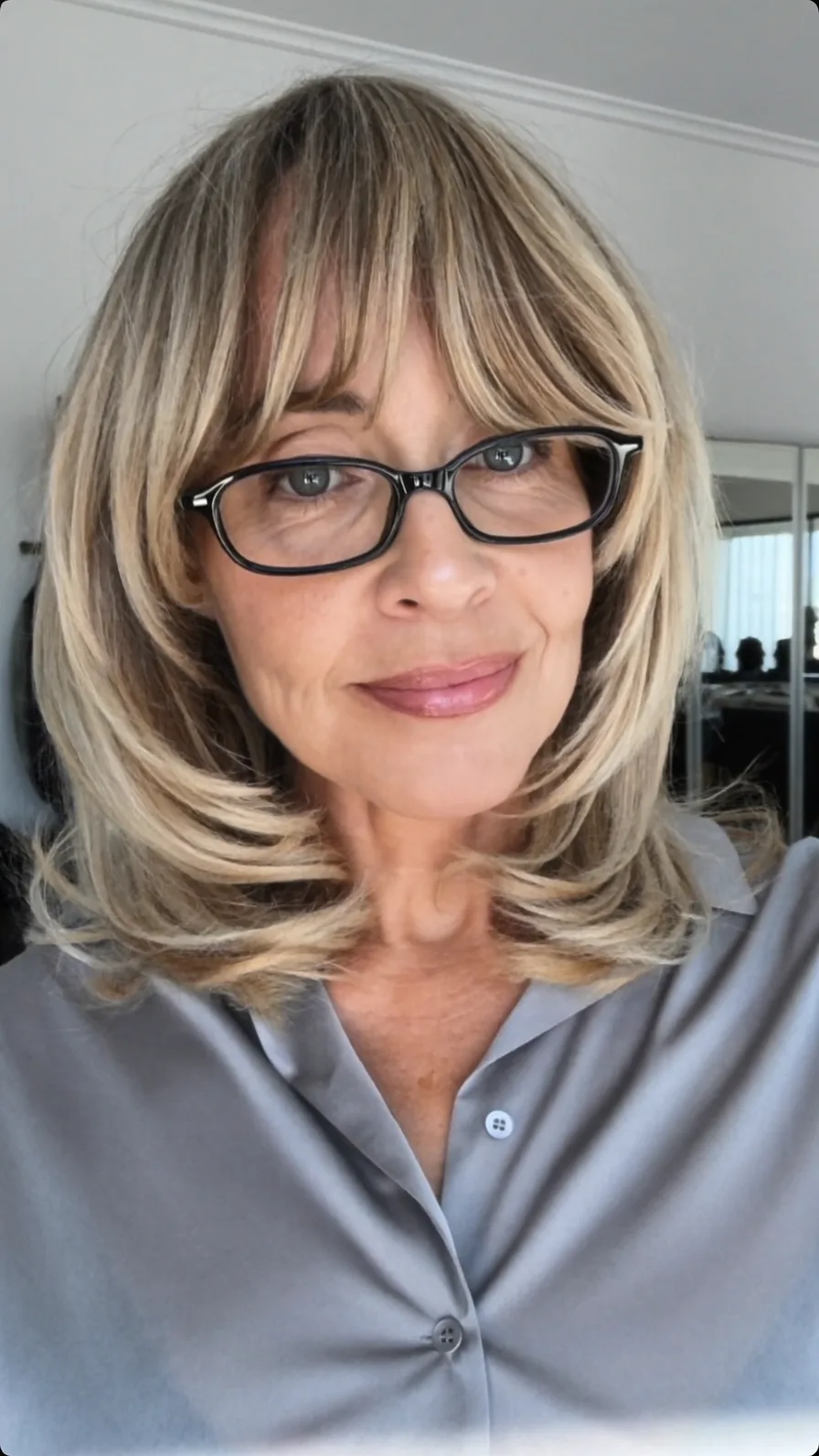 Soft Layered Medium-Length Curtain Bangs with Balayage Highlights