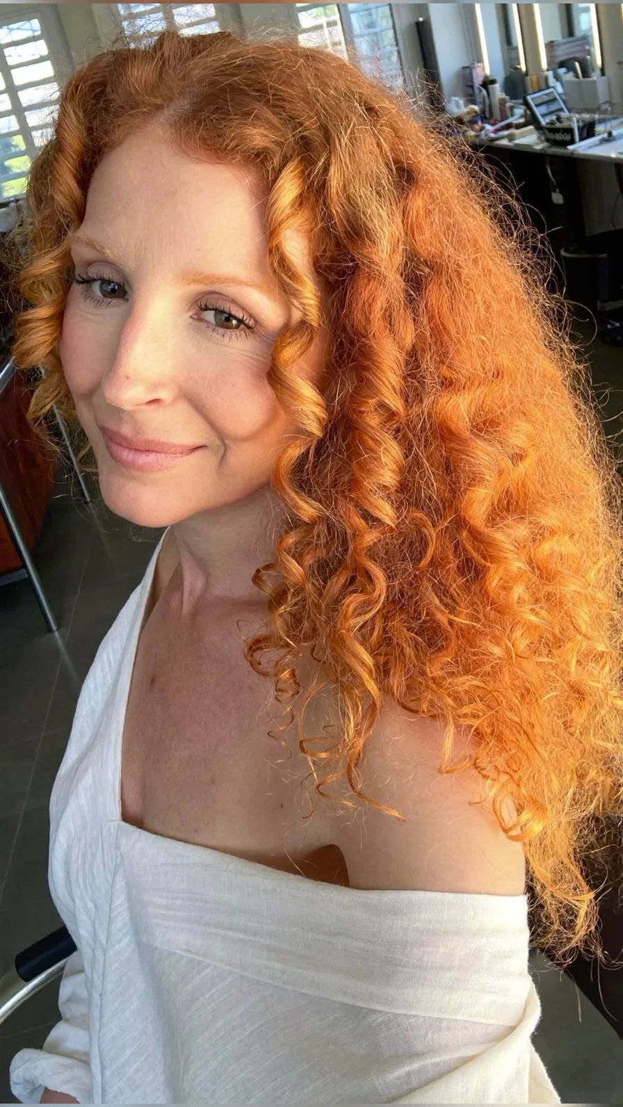 Voluminous Long Natural Curly Copper Red Hairstyle