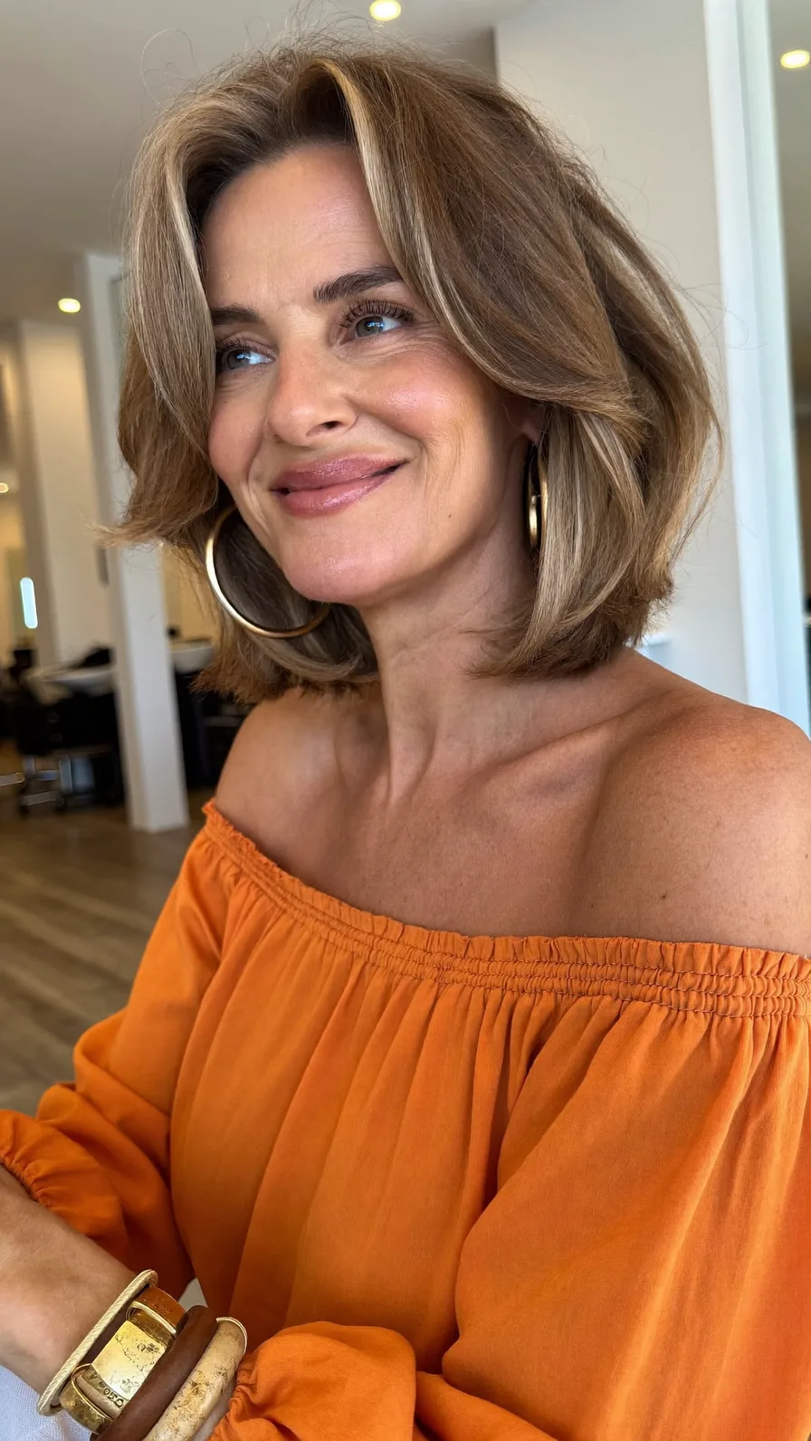 Modern Layered Lob with Warm Honey Blonde Curtain Bangs