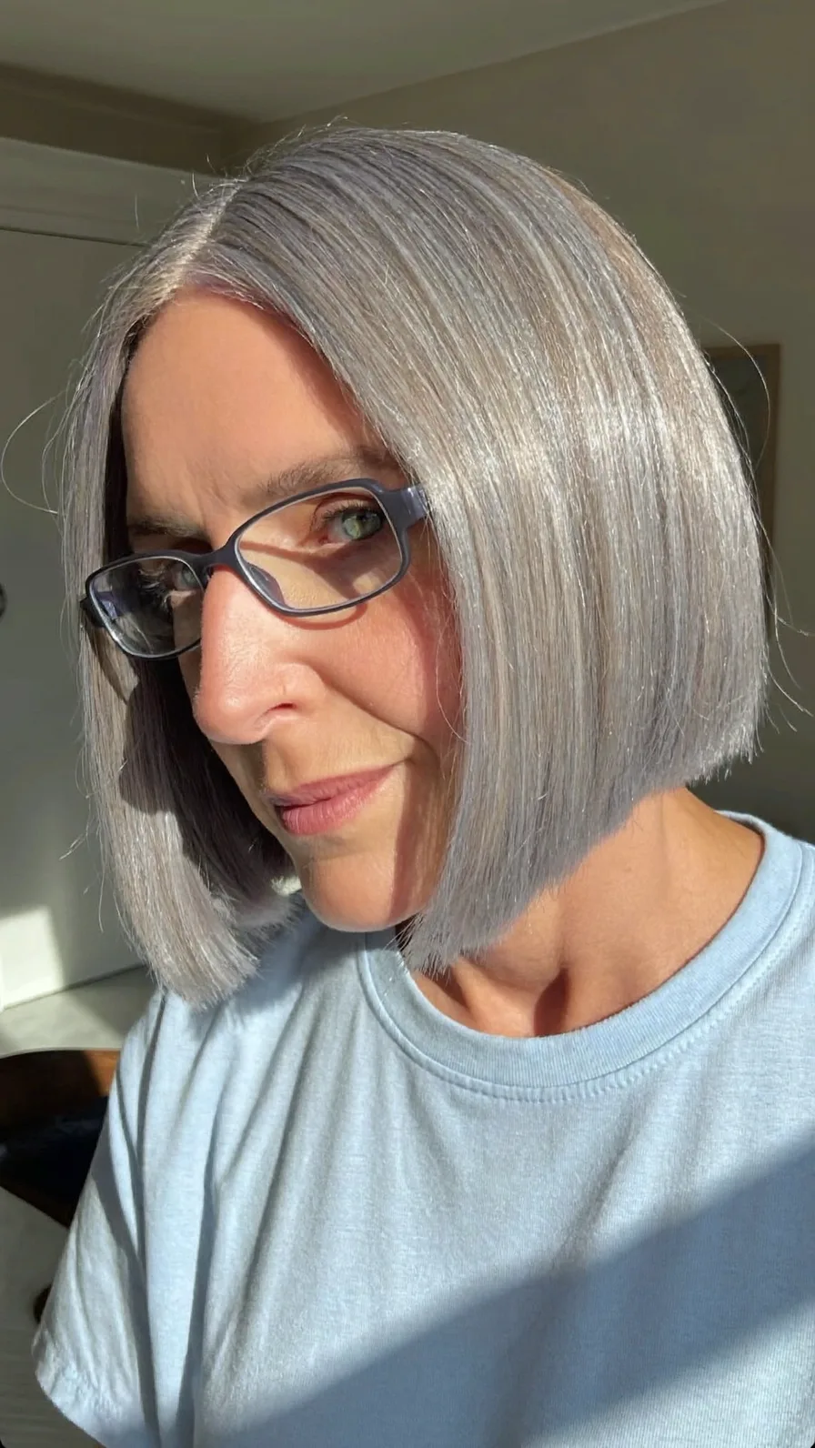 Sleek Chin-Length Silver Gray Blunt Cut Bob Hairstyle