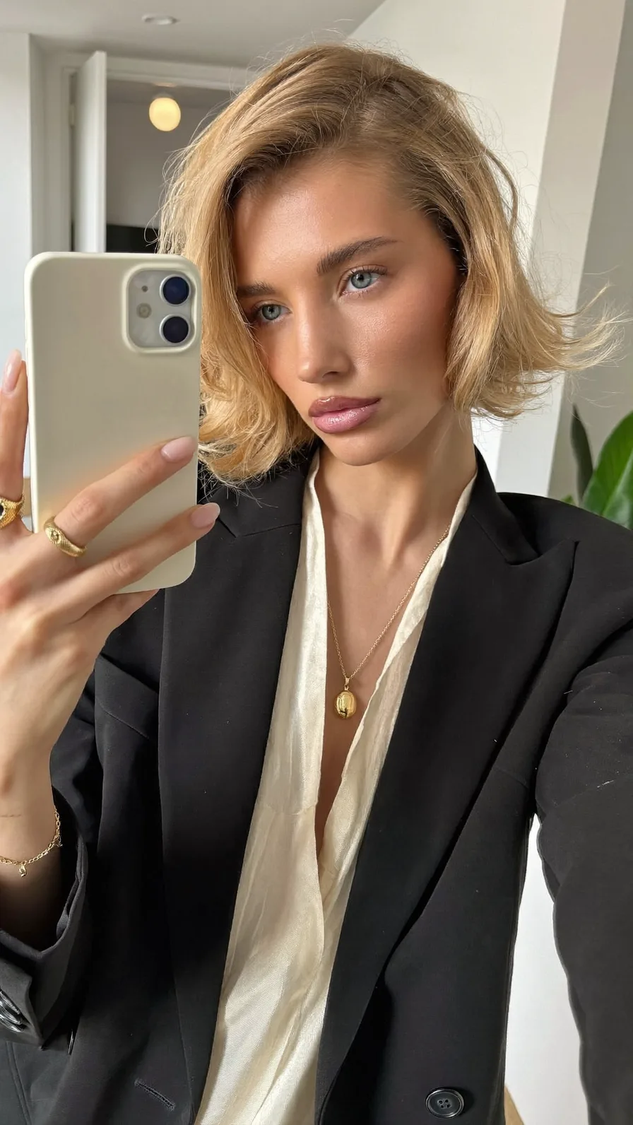 Voluminous Side-Swept Wavy Chin-Length Bob Hairstyle