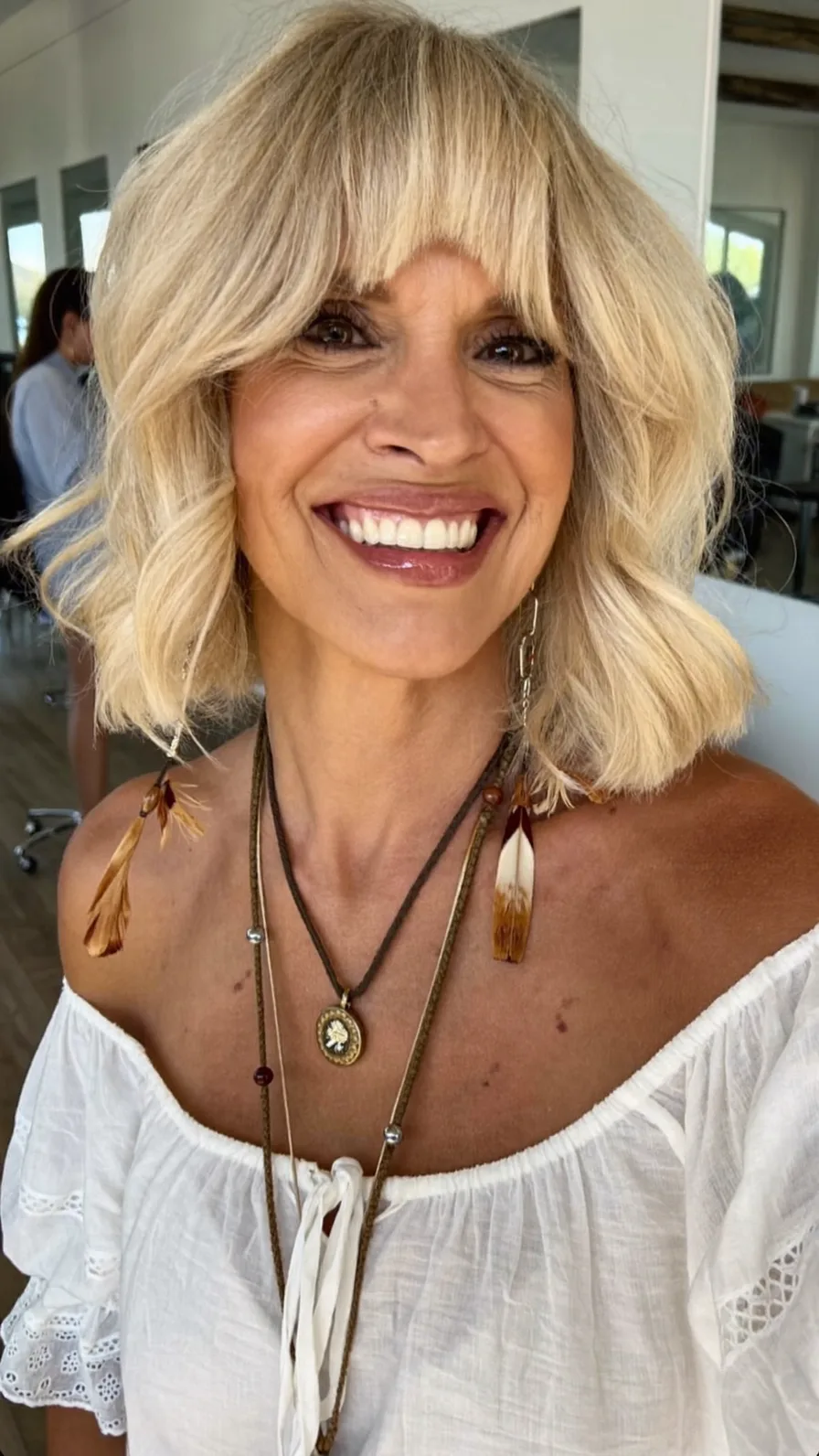 Voluminous Chin-Length Bob with Blunt Bangs and Texture