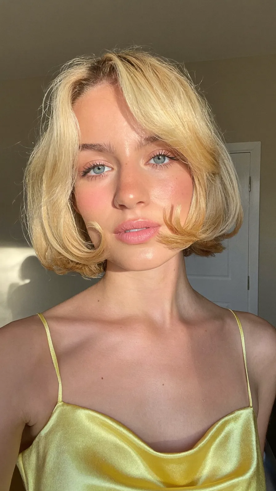 Chin-Length Warm Honey Blonde Bob with Curtain Bangs