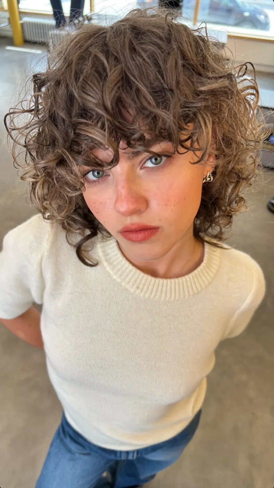 Voluminous Curly Bob with Textured Curtain Bangs