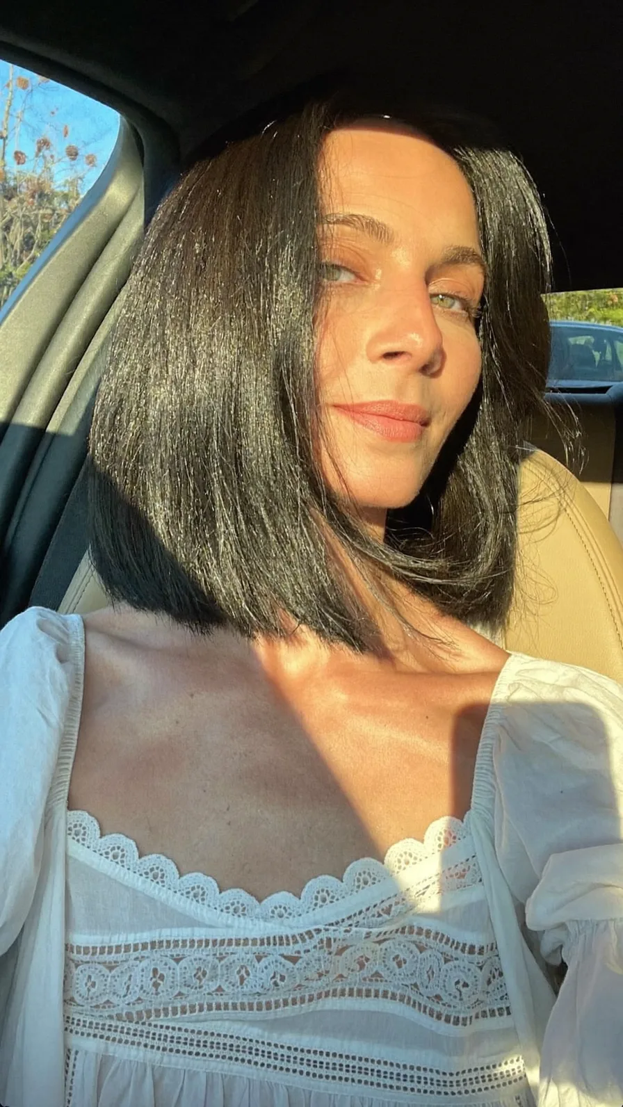 Sleek Chin-Length Blunt Black Bob with Center Part