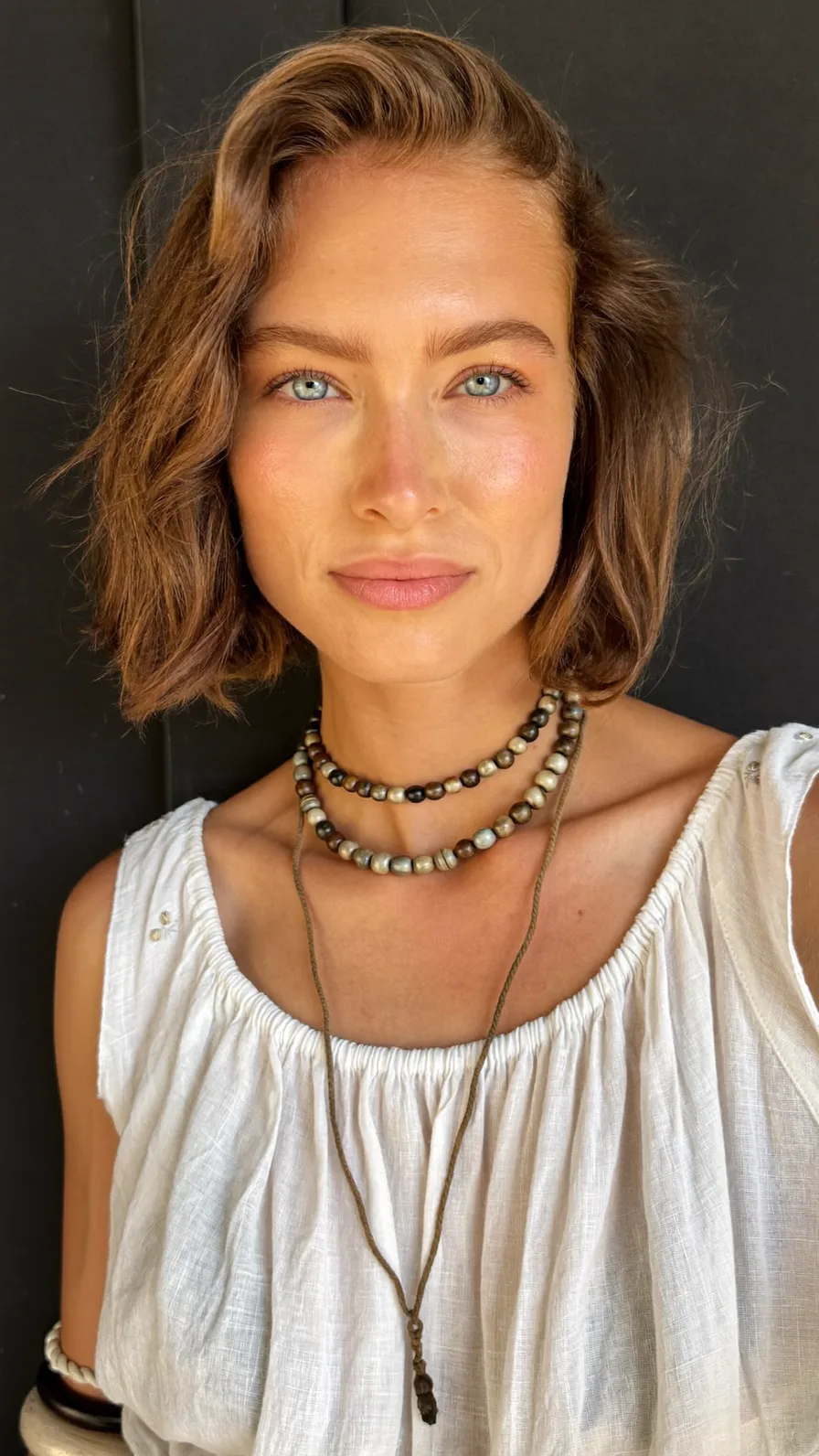 Chic Wavy Chin-Length Bob with Natural Warm Brown Color