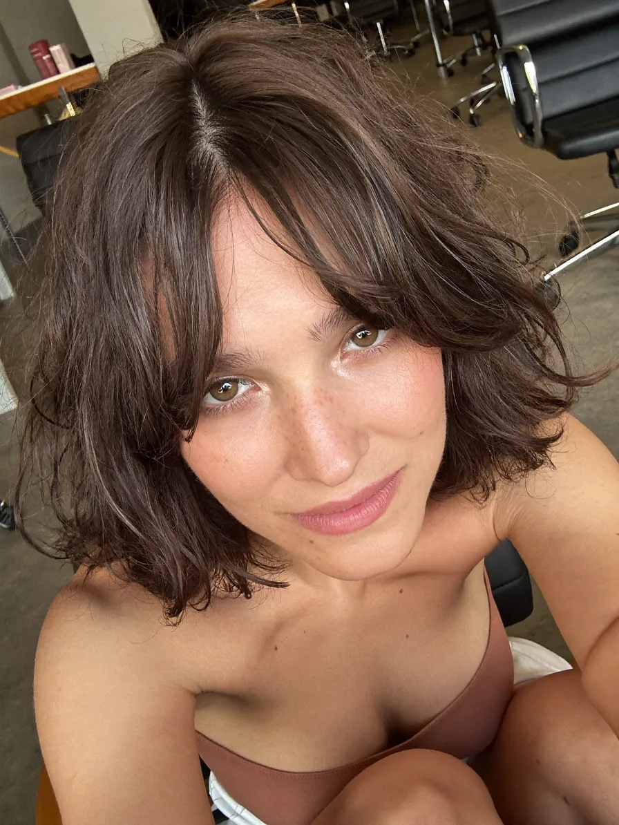 Textured Wavy Shag with Curtain Bangs for Medium Brown Hair
