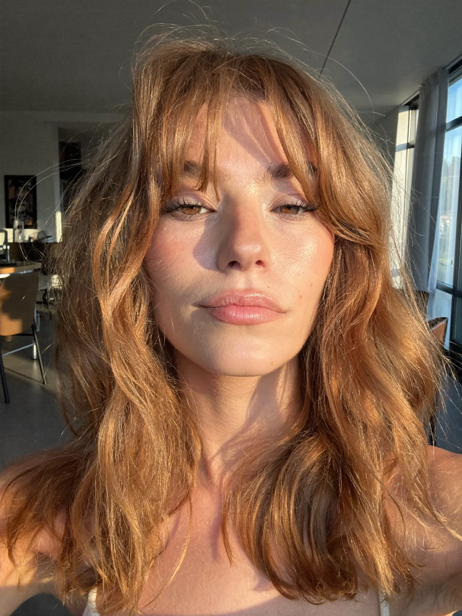 Soft Bronde Lob Featuring Curtain Bangs and Effortless Texture