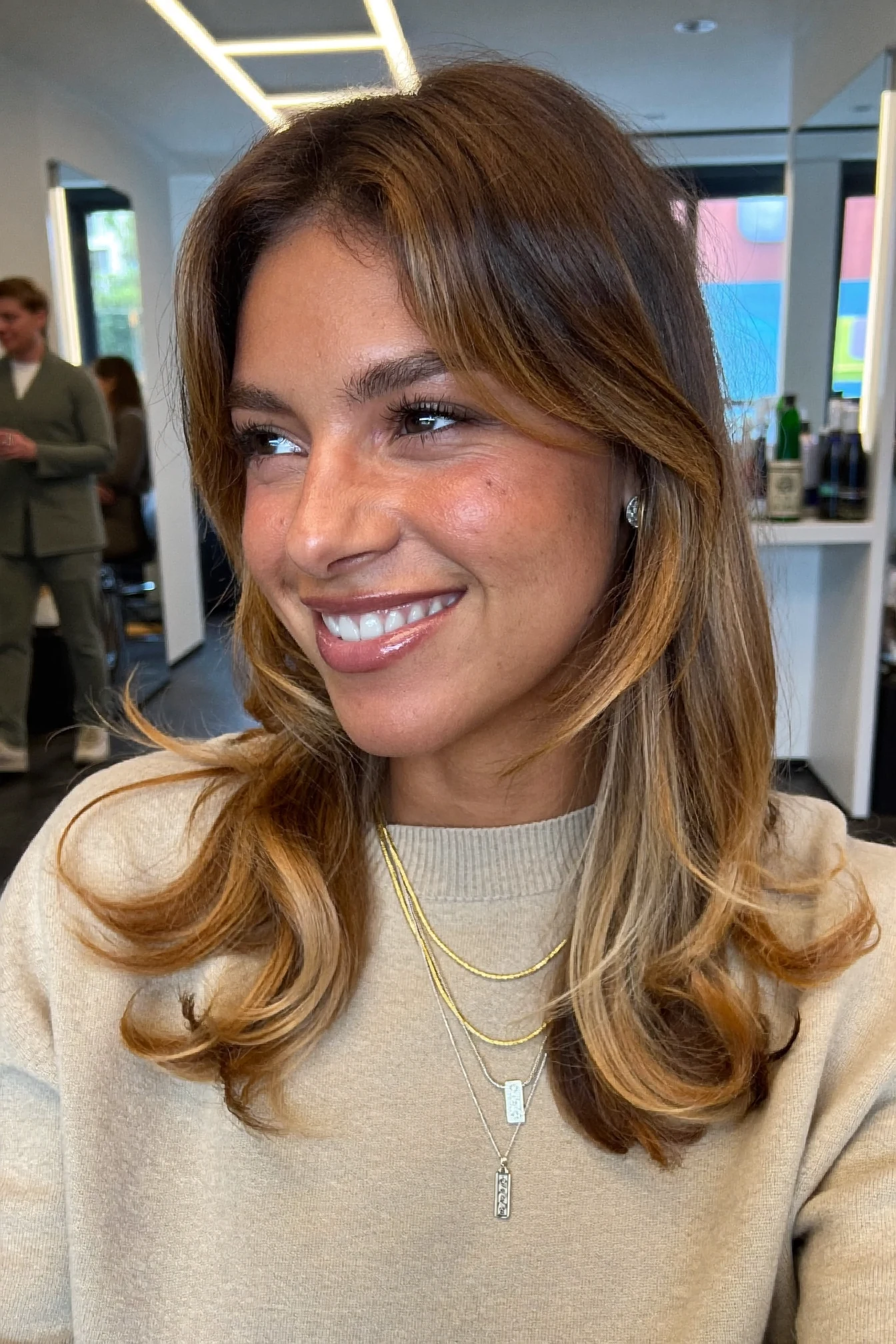 Curtain Bangs and Face-Framing Caramel Highlights Lob