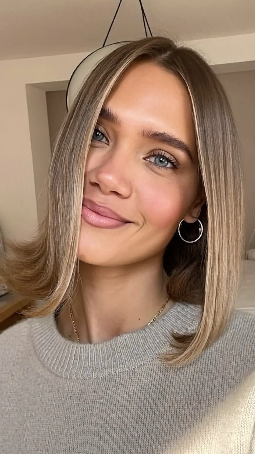 Shoulder-Length Ash Blonde Balayage Lob Hairstyle with Rounded Ends