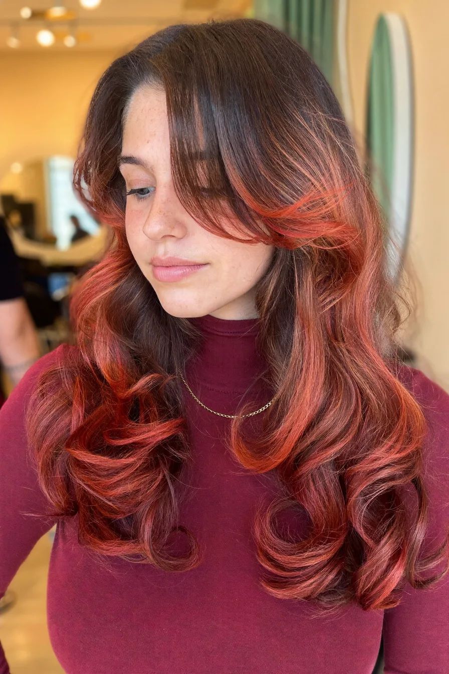 Lustrous Auburn Red Long Layered Cut With Voluminous Curls