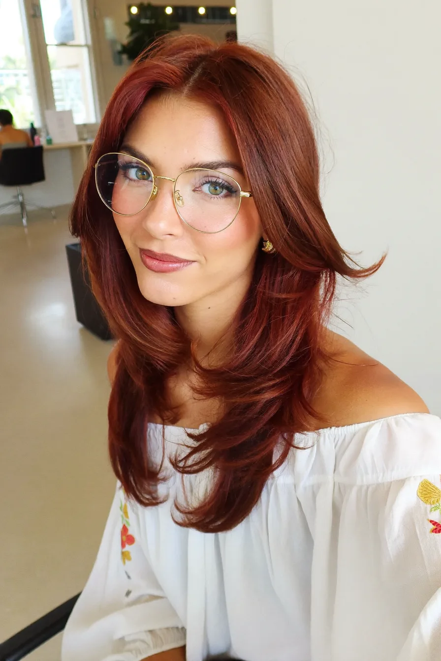 Glossy Auburn Red Long Layered Haircut With Face-Framing Layers