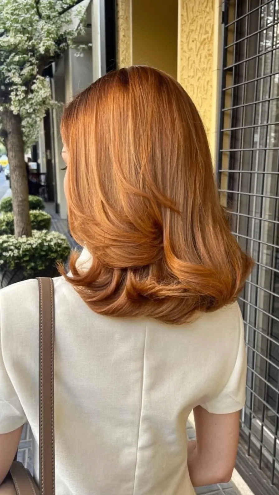 Sleek Warm Copper Shoulder-Length Long Layered Hair