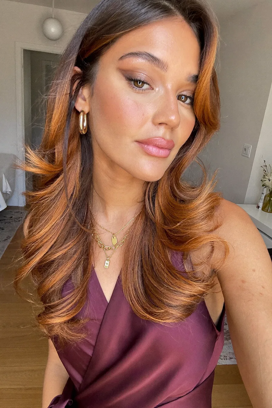 Luxurious Copper Red Voluminous Blowout with Face-Framing Layers