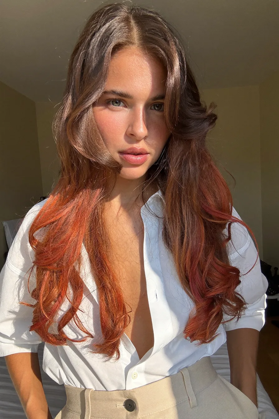 Glossy Face-Framing Layers with Subtle Copper Red Ends
