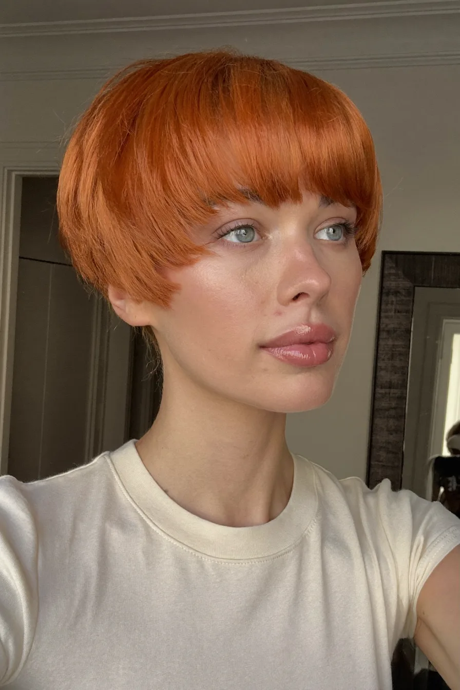 Sleek Copper Red Bowl Cut with Precision Bangs for Texture