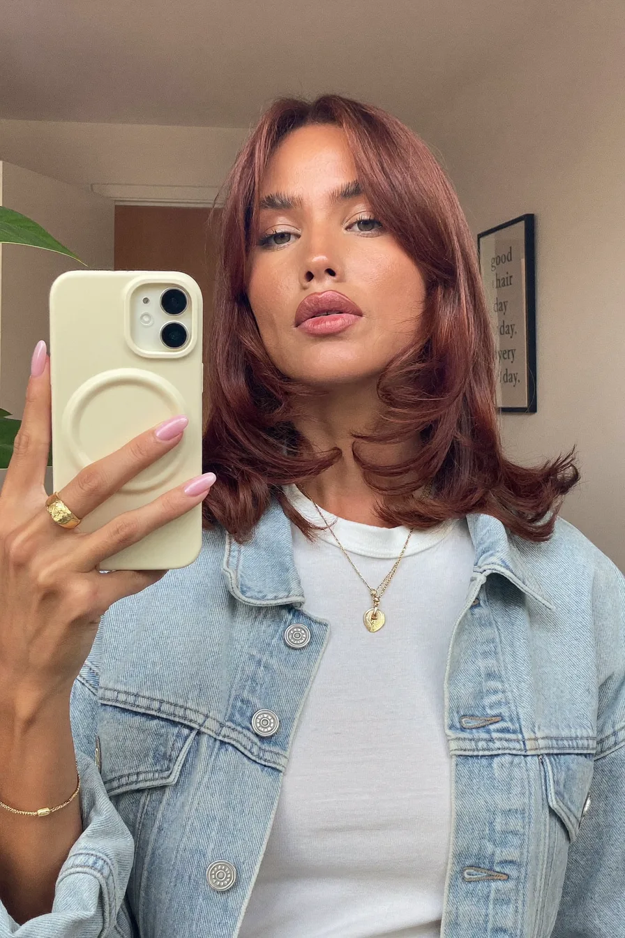 Face-Framing Copper Red Shag with Soft Curtain Bangs