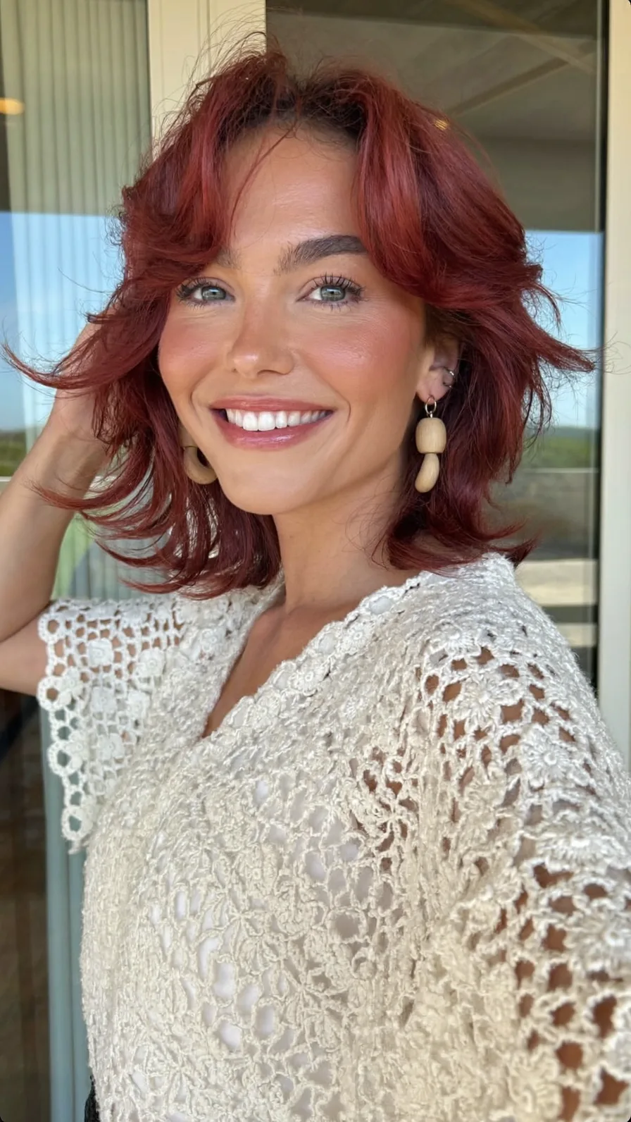 Textured Shoulder-Length Shag with Curtain Bangs