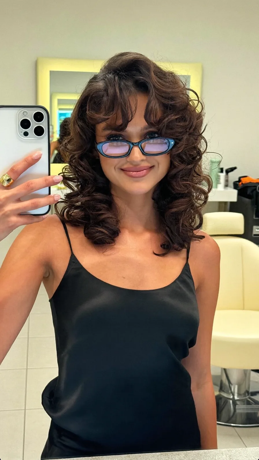 Voluminous Curly Layered Bob with Soft Curtain Bangs