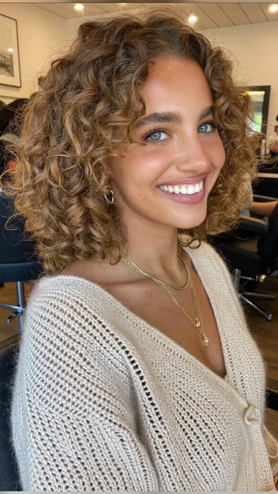 Voluminous Curly Bob with Honey Balayage Highlights