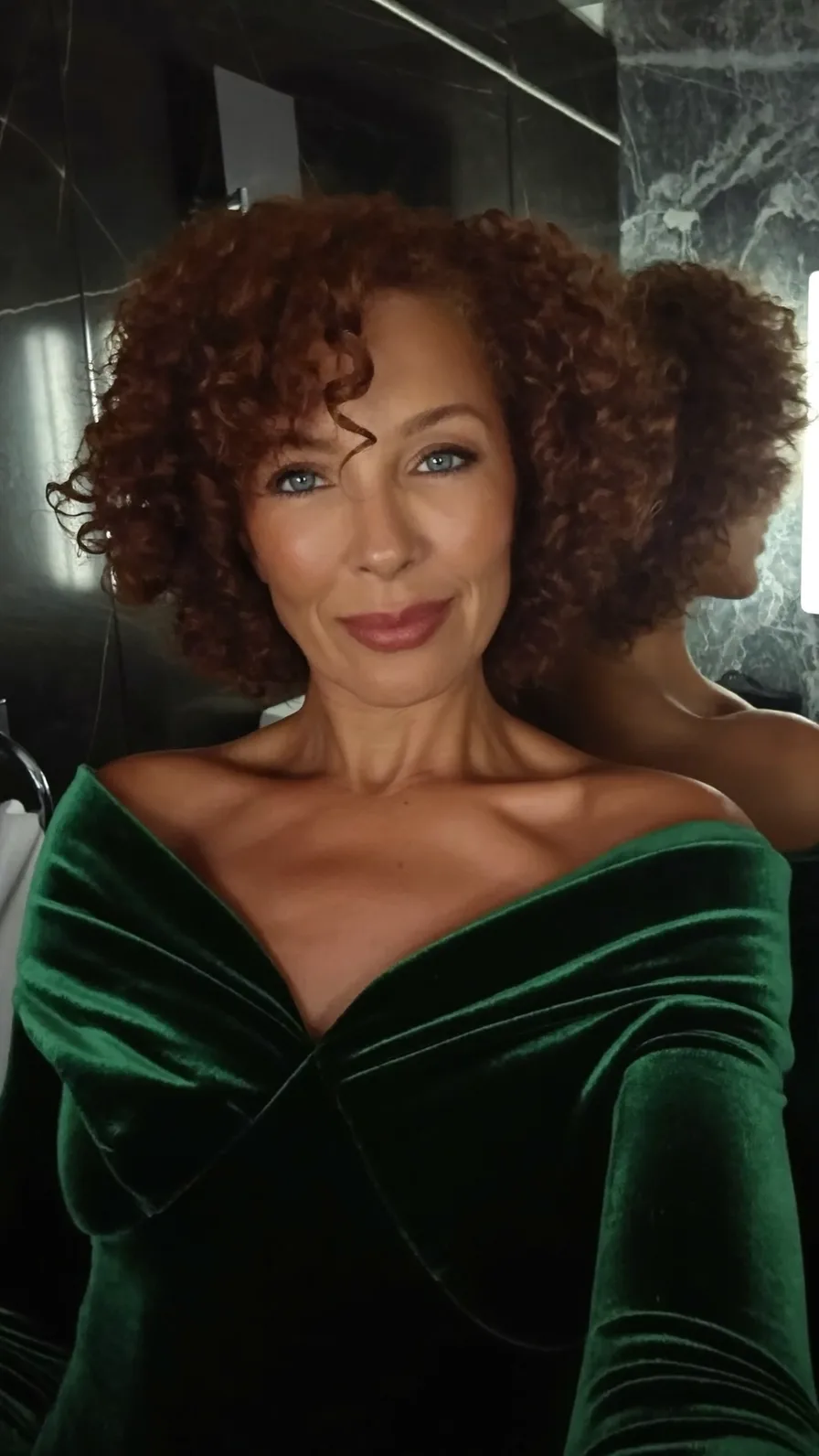 Voluminous Curly Shag with Rich Auburn Tones