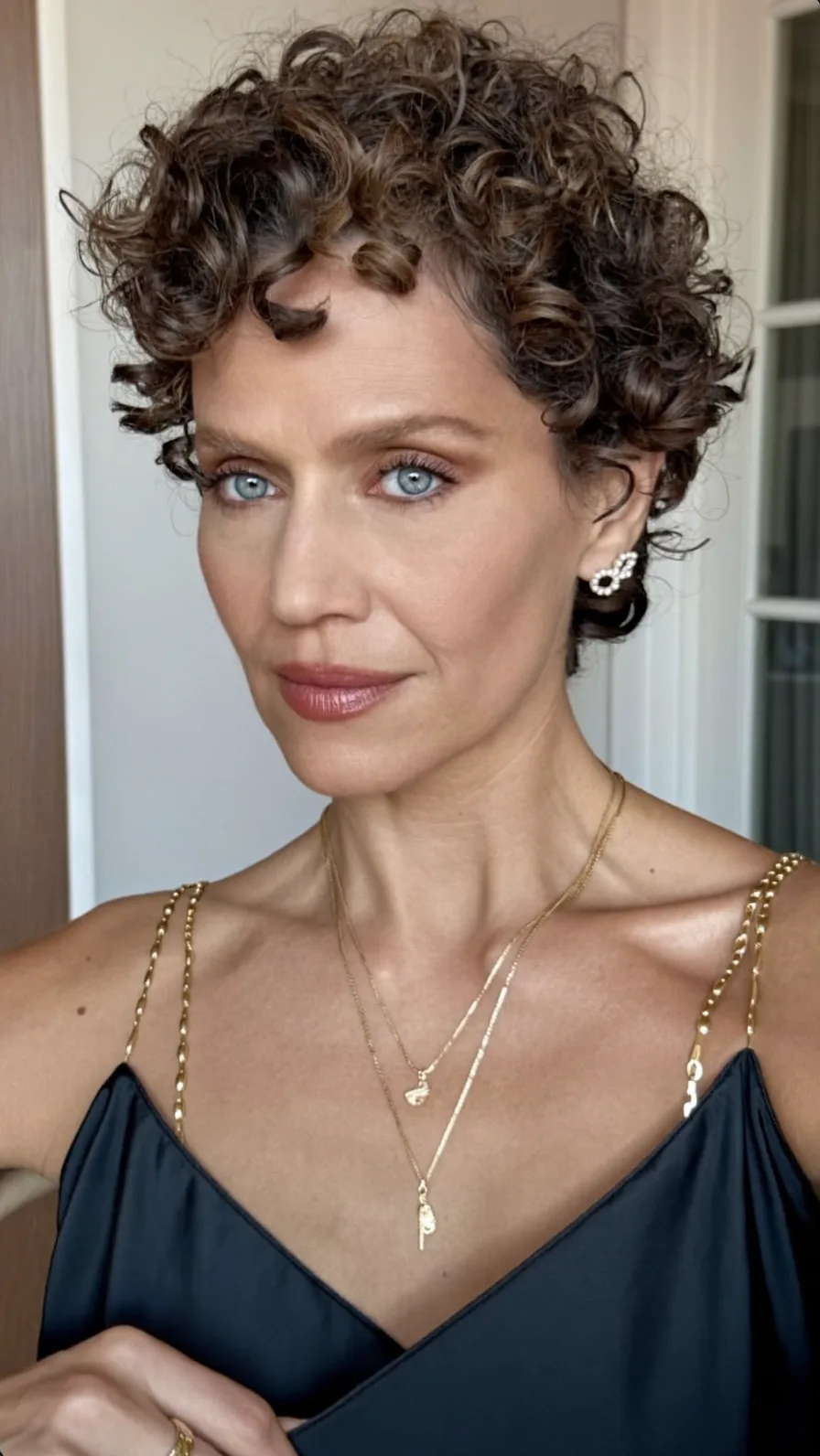 Voluminous Textured Curly Pixie with Multi-dimensional Highlights