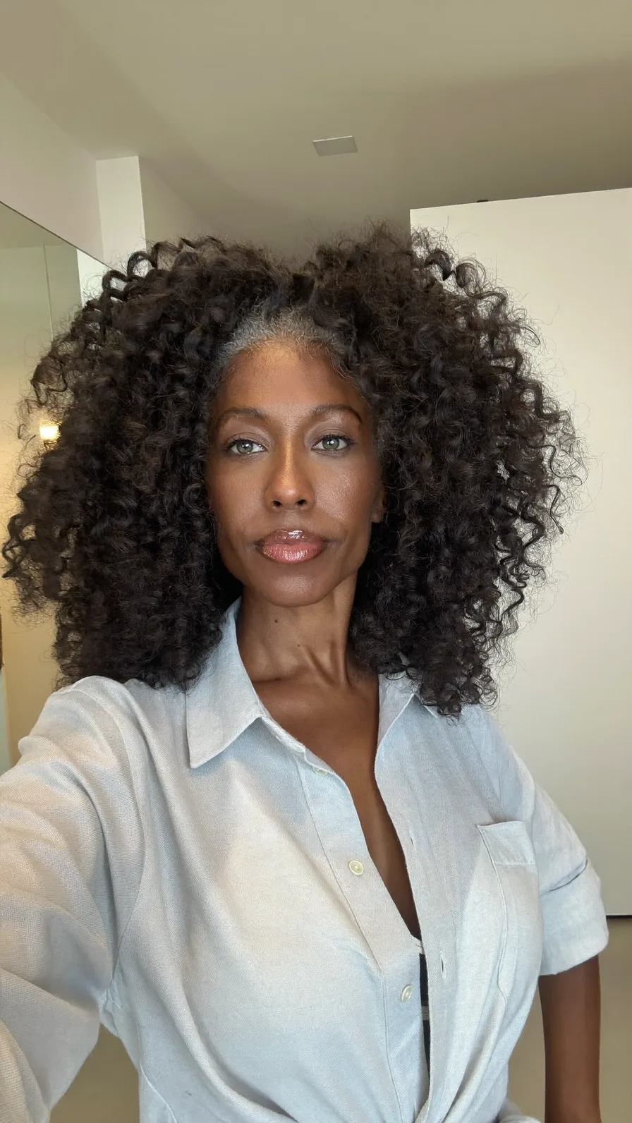 Voluminous Natural Curly Long Layers with Center Part