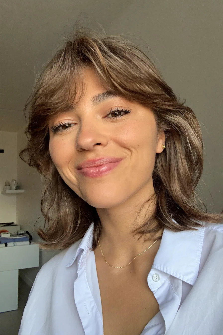 Soft Textured Lob with Face-Framing Curtain Bangs
