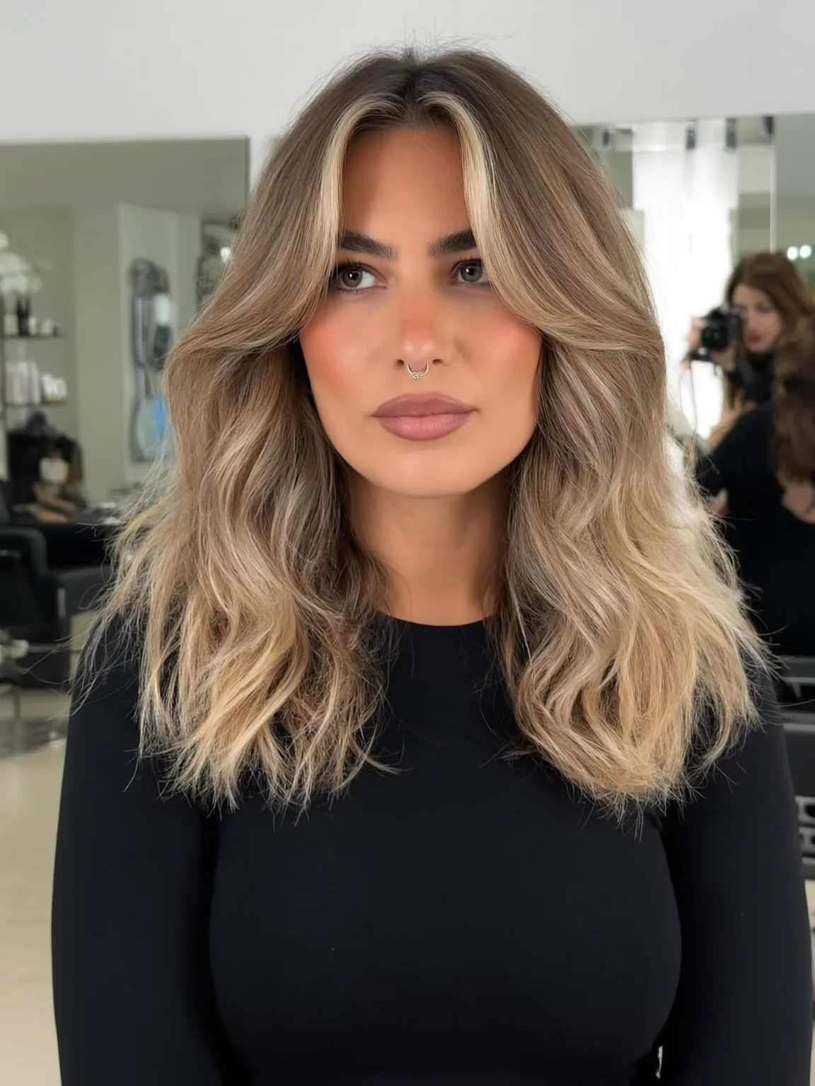 Voluminous Honey Blonde Balayage Wavy Lob with Curtain Bangs