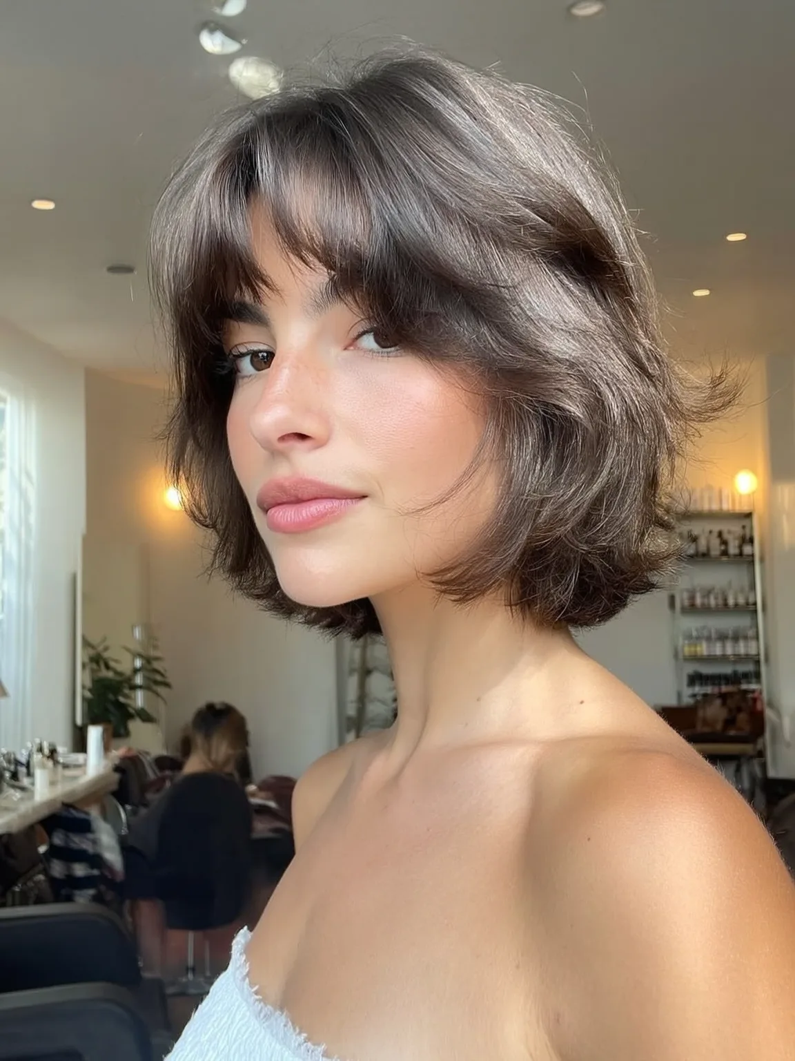Wavy Rich Chocolate Brown Bob with Face-Framing Curtain Bangs