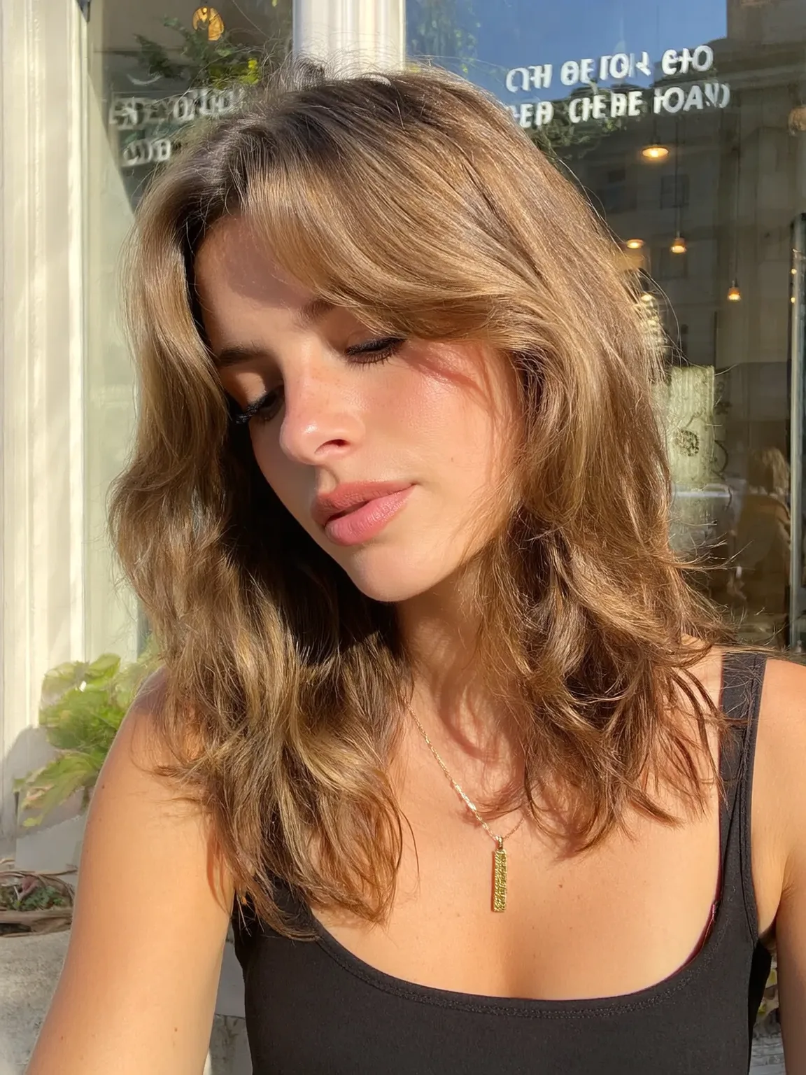 Shoulder-Length Layers with Golden Honey Brown Balayage