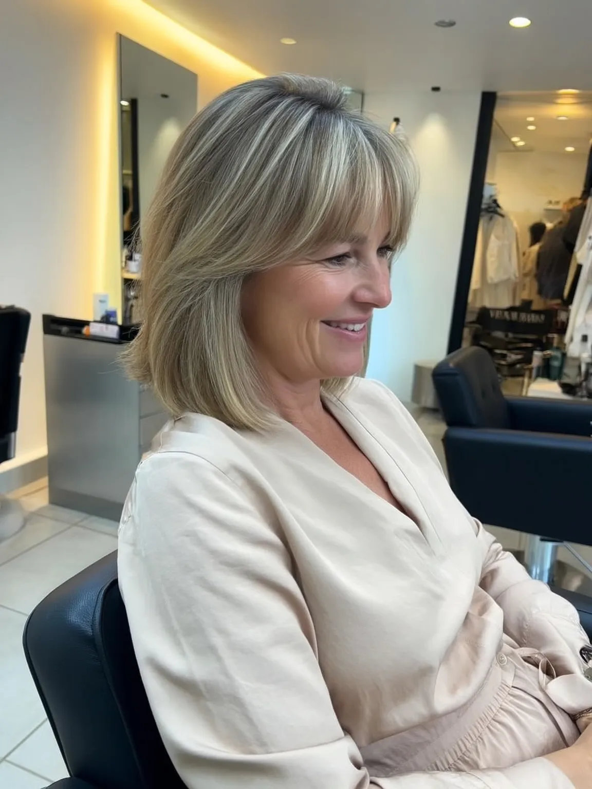 Straight Ash Blonde Shoulder-Length Bob with Subtle Highlights